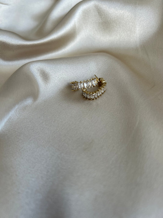 White stone earring gold